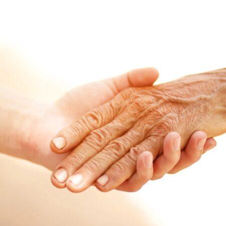 Hands interlocking