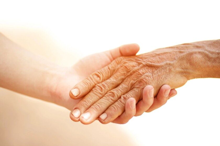 Hands interlocking